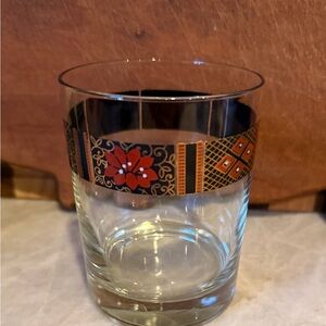 Decorative Glass Tumbler with Red and Gold Accents